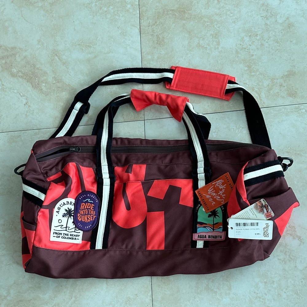 Agua Bendita Burgundy and Coral Duffel Bag